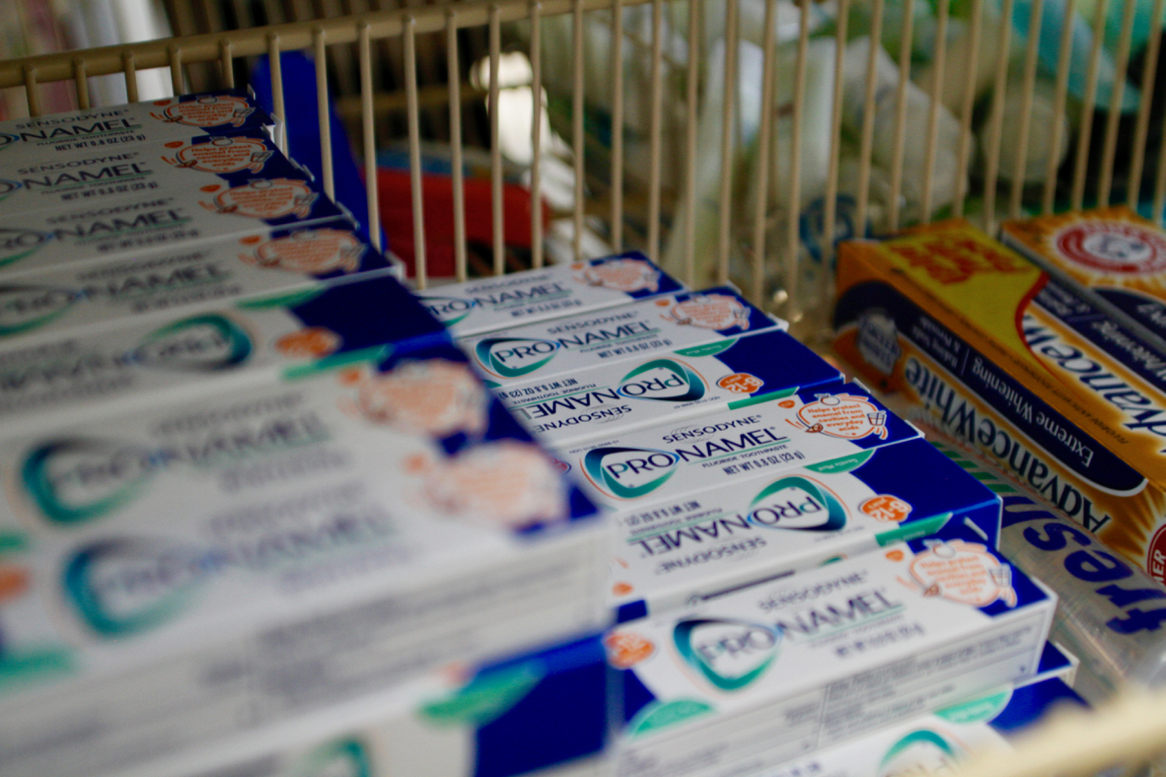 close up of basket of toothpaste included in ex-offender kits